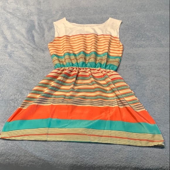 Small sheer mini dress. Needs a slip or something underneath. - Picture 5 of 5